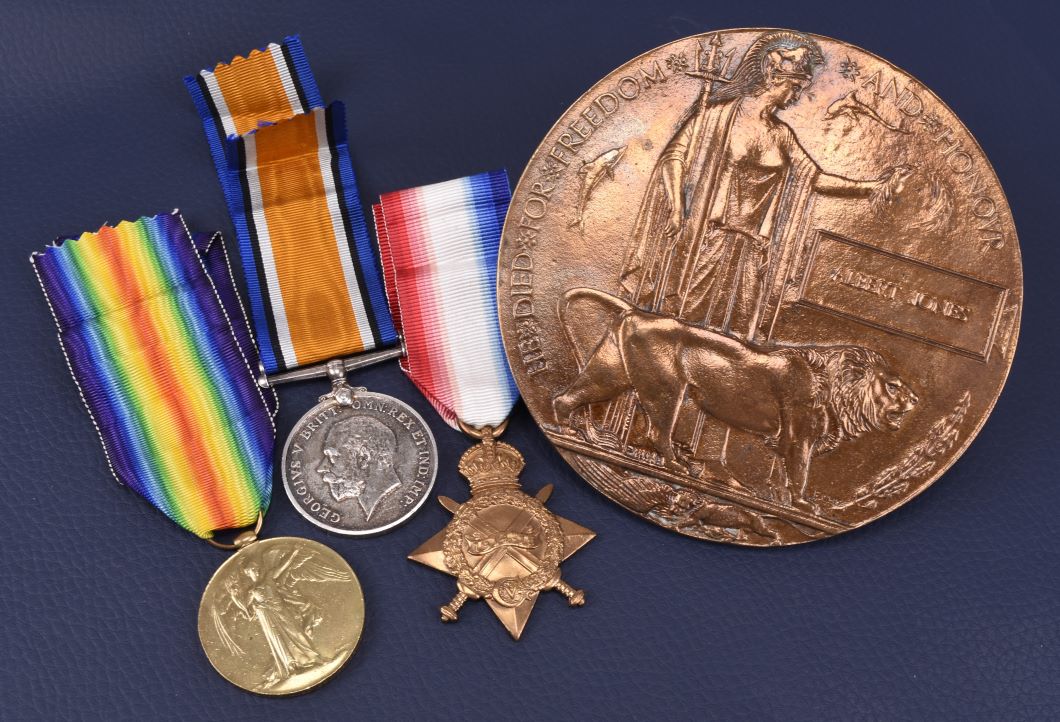 A First World War Killed in Action medal trio and death plaque to 11519 Private Albert Jones, 6th King's Shropshire Light Infantry. 1914-15 Star, 1914-18 War Medal and Victory Medal named to "11519 PTE. A. JONES SHROPS. L.I". Halls Fine Art Shrewsbury